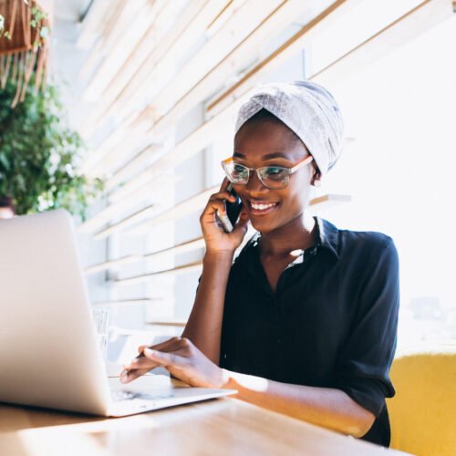African american business woman with phone